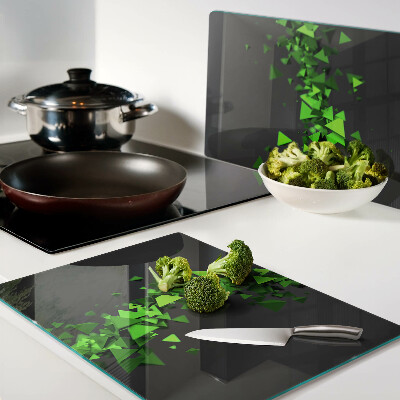 Tagliere in vetro temperato con motivo a triangoli verdi su sfondo nero