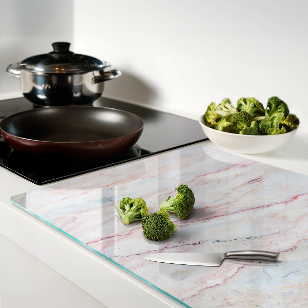 Tagliere in vetro temperato con motivo marmorizzato nei toni del rosa