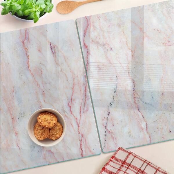 Tagliere in vetro temperato con motivo marmorizzato nei toni del rosa