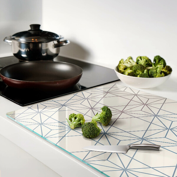 Tagliere in vetro con motivo geometrico di triangoli e linee