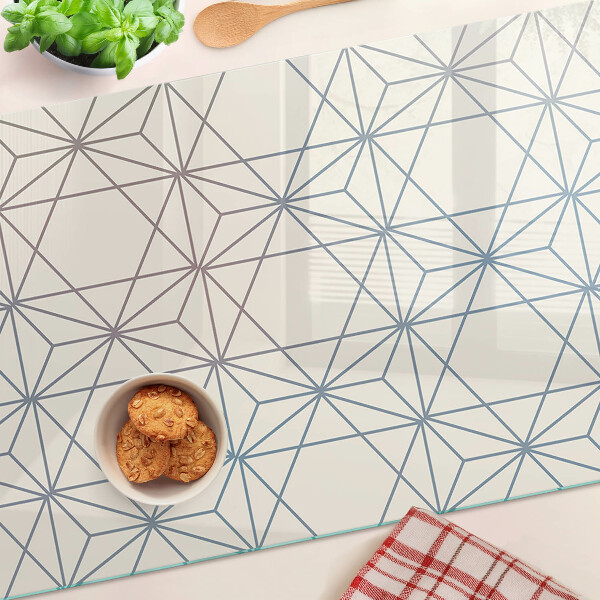 Tagliere in vetro con motivo geometrico di triangoli e linee