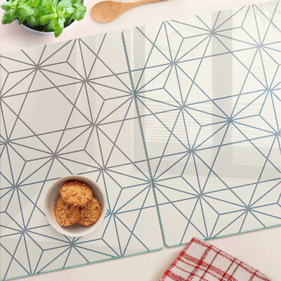 Tagliere in vetro con motivo geometrico di triangoli e linee
