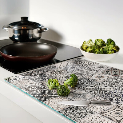 Tagliere in vetro temperato con motivo a piastrelle nei toni del grigio