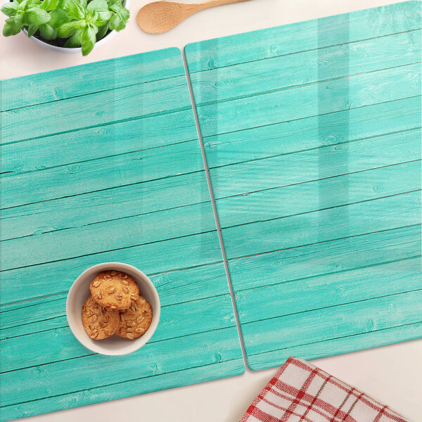 Tagliere in vetro temperato con motivo ispirato alle assi del pavimento in tonalità turchese