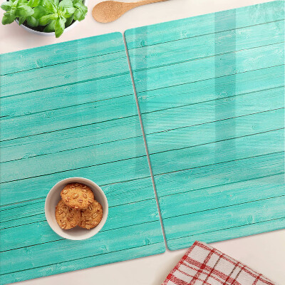 Tagliere in vetro temperato con motivo ispirato alle assi del pavimento in tonalità turchese