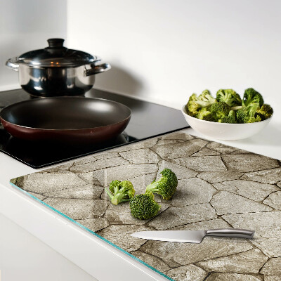 Tagliere in vetro temperato con motivo a mosaico di pietra nei toni del marrone