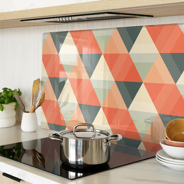 Tagliere in vetro temperato con motivo a triangoli nei toni dell'arancione
