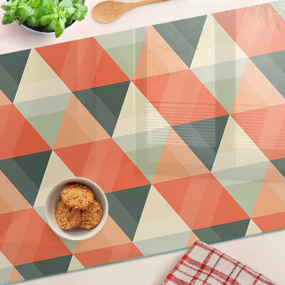 Tagliere in vetro temperato con motivo a triangoli nei toni dell'arancione