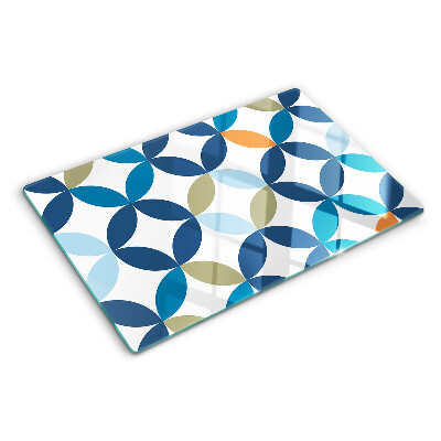 Tagliere in vetro con motivo di foglie geometriche in vari colori