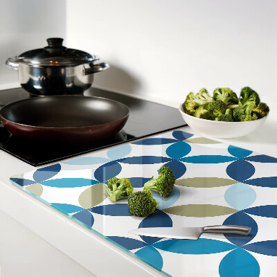 Tagliere in vetro con motivo di foglie geometriche in vari colori