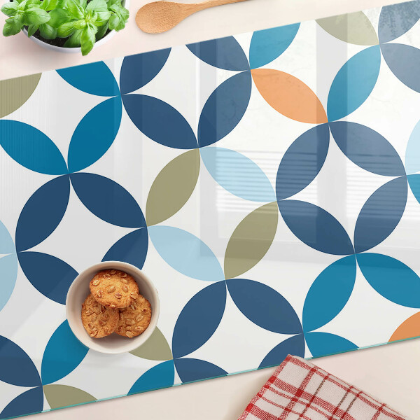 Tagliere in vetro con motivo di foglie geometriche in vari colori