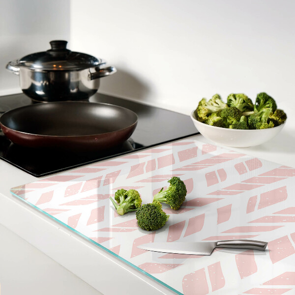 Tagliere in vetro con decorazione a foglie nelle tonalità del rosa