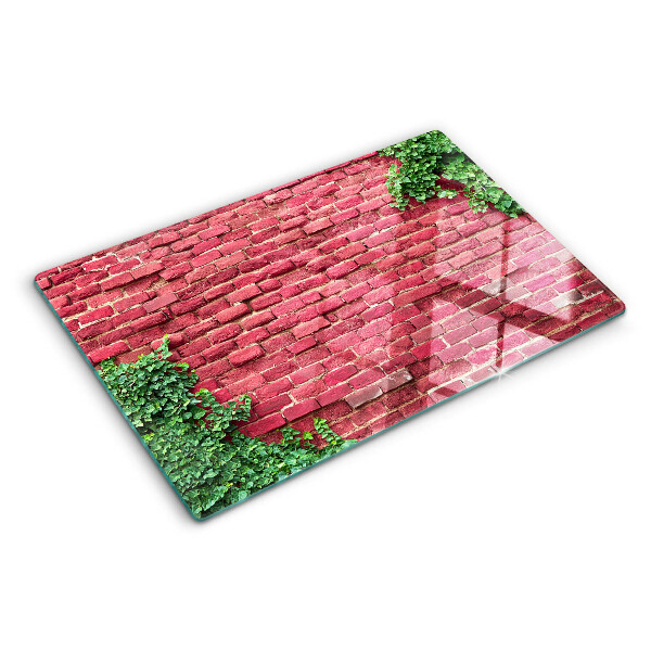 Tagliere in vetro Muro di mattoni con vegetazione