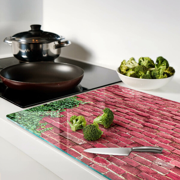 Tagliere in vetro con stampa raffigurante un muro di mattoni con vegetazione