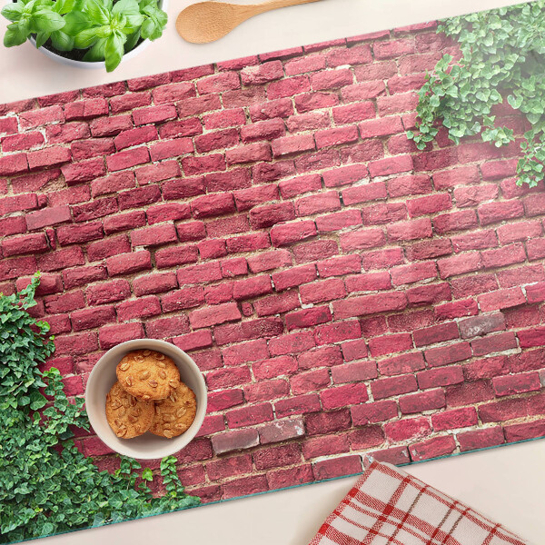 Tagliere in vetro con stampa raffigurante un muro di mattoni con vegetazione