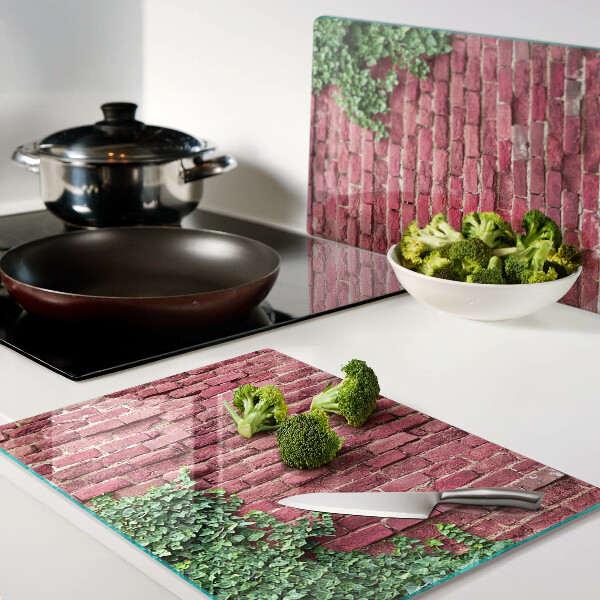 Tagliere in vetro con stampa raffigurante un muro di mattoni con vegetazione