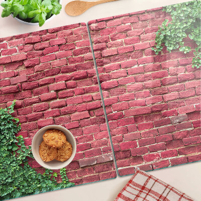 Tagliere in vetro con stampa raffigurante un muro di mattoni con vegetazione