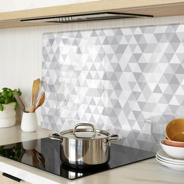 Tagliere in vetro temperato con motivo a triangoli nei toni del grigio