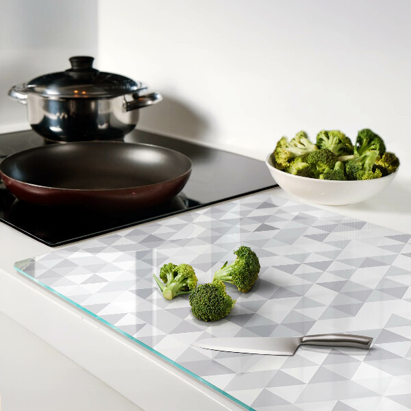 Tagliere in vetro temperato con motivo a triangoli nei toni del grigio