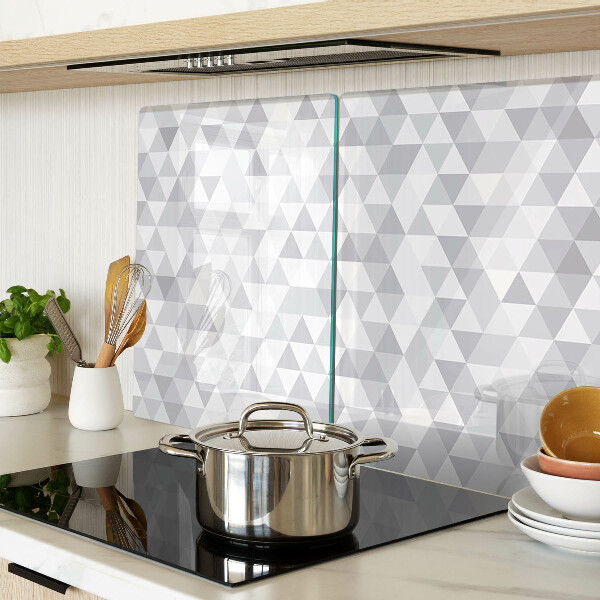 Tagliere in vetro temperato con motivo a triangoli nei toni del grigio