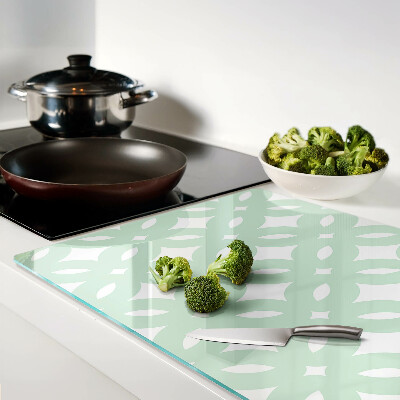 Tagliere in vetro temperato con motivi geometrici nei toni pastello