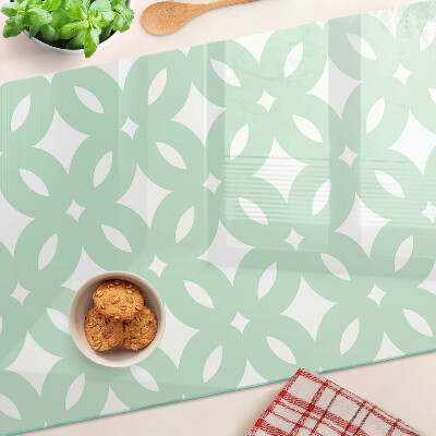 Tagliere in vetro temperato con motivi geometrici nei toni pastello