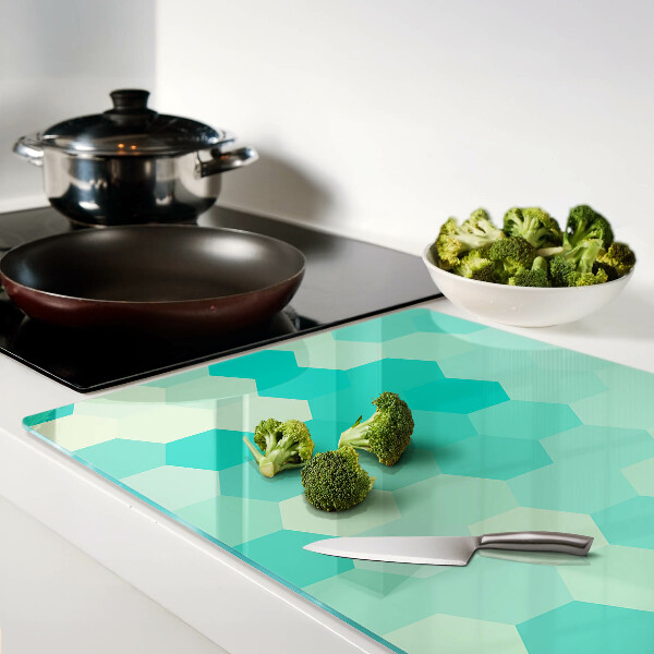 Tagliere in vetro con motivo esagonale nei toni del turchese