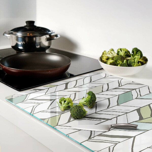 Tagliere in vetro temperato con motivo fogliaceo nei toni del verde
