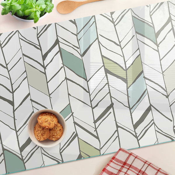 Tagliere in vetro temperato con motivo fogliaceo nei toni del verde