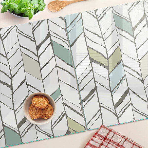 Tagliere in vetro temperato con motivo fogliaceo nei toni del verde