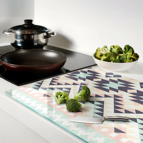 Tagliere in vetro temperato con motivo geometrico nei toni pastello