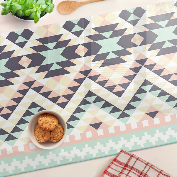 Tagliere in vetro temperato con motivo geometrico nei toni pastello