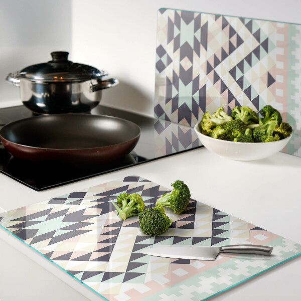 Tagliere in vetro temperato con motivo geometrico nei toni pastello