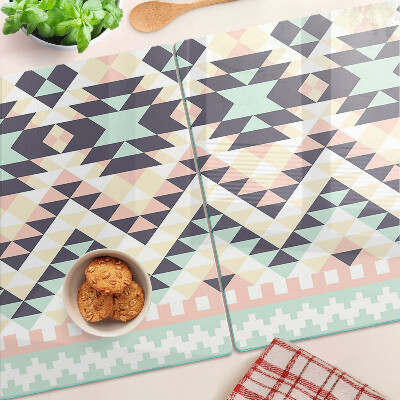 Tagliere in vetro temperato con motivo geometrico nei toni pastello