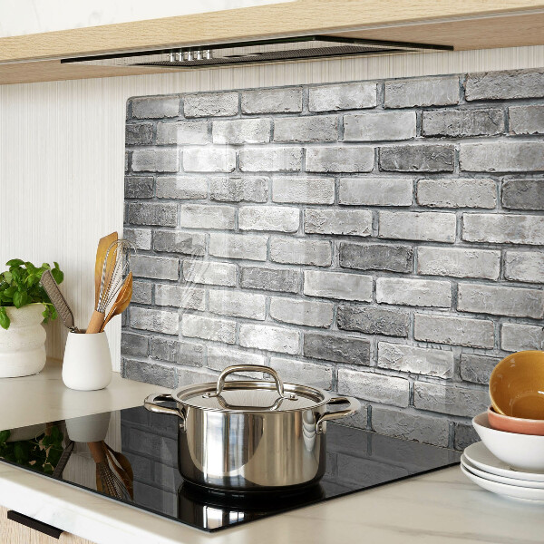 Tagliere in vetro temperato con motivo a muro di mattoni nei toni del grigio