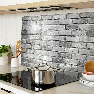 Tagliere in vetro temperato con motivo a muro di mattoni nei toni del grigio