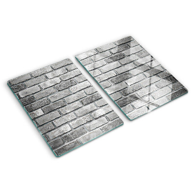 Tagliere in vetro temperato con motivo a muro di mattoni nei toni del grigio