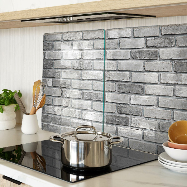 Tagliere in vetro temperato con motivo a muro di mattoni nei toni del grigio