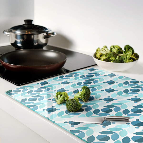 Tagliere in vetro con decorazione a foglie nei toni del blu