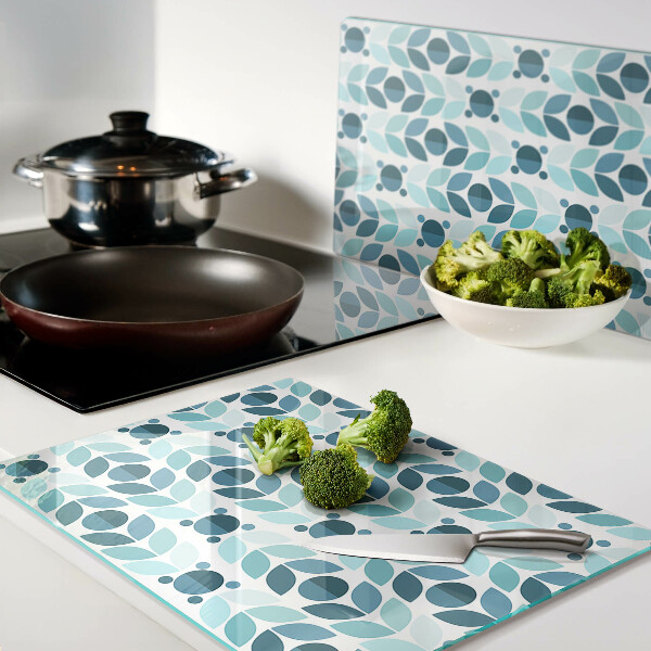 Tagliere in vetro con decorazione a foglie nei toni del blu