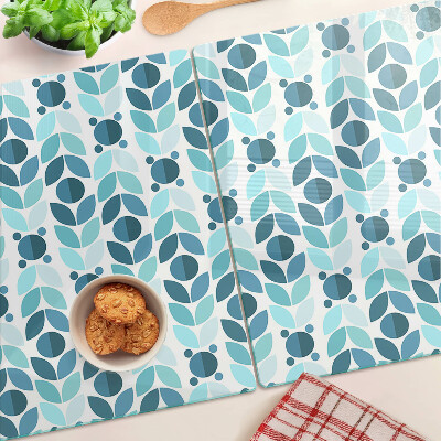 Tagliere in vetro con decorazione a foglie nei toni del blu