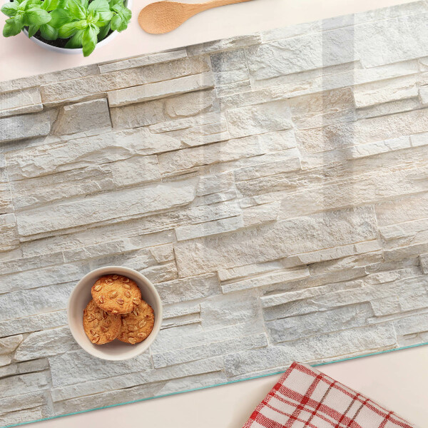 Tagliere in vetro temperato con motivo in pietra naturale nei toni del beige