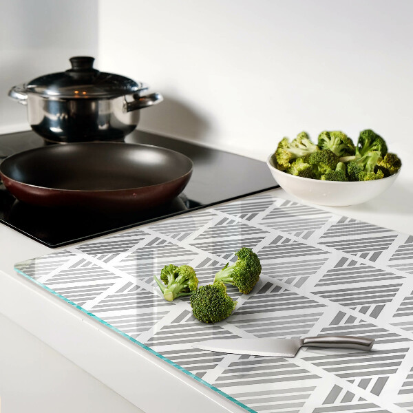 Tagliere in vetro temperato con motivi geometrici nei toni del grigio