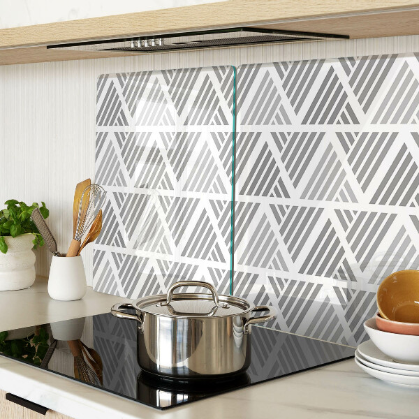 Tagliere in vetro temperato con motivi geometrici nei toni del grigio