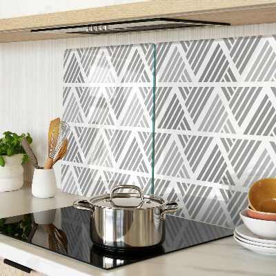 Tagliere in vetro temperato con motivi geometrici nei toni del grigio