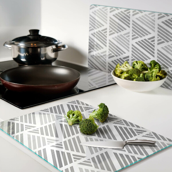 Tagliere in vetro temperato con motivi geometrici nei toni del grigio