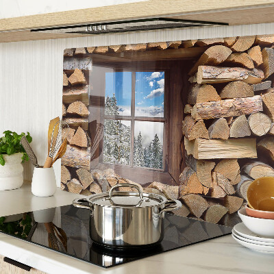 Tagliere in vetro temperato con stampa raffigurante un paesaggio invernale visto attraverso una finestra