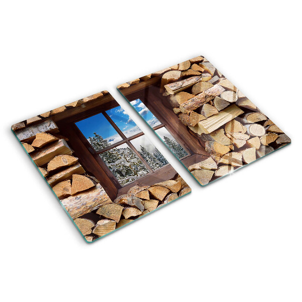 Tagliere in vetro temperato con stampa raffigurante un paesaggio invernale visto attraverso una finestra