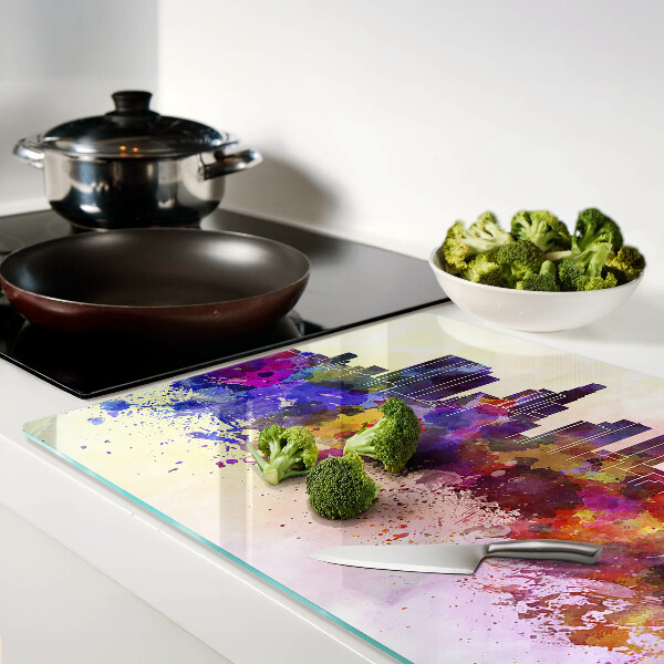 Tagliere in vetro temperato con stampa a acquerello raffigurante uno skyline urbano