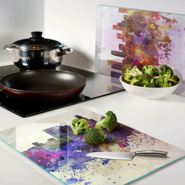 Tagliere in vetro temperato con stampa a acquerello raffigurante uno skyline urbano